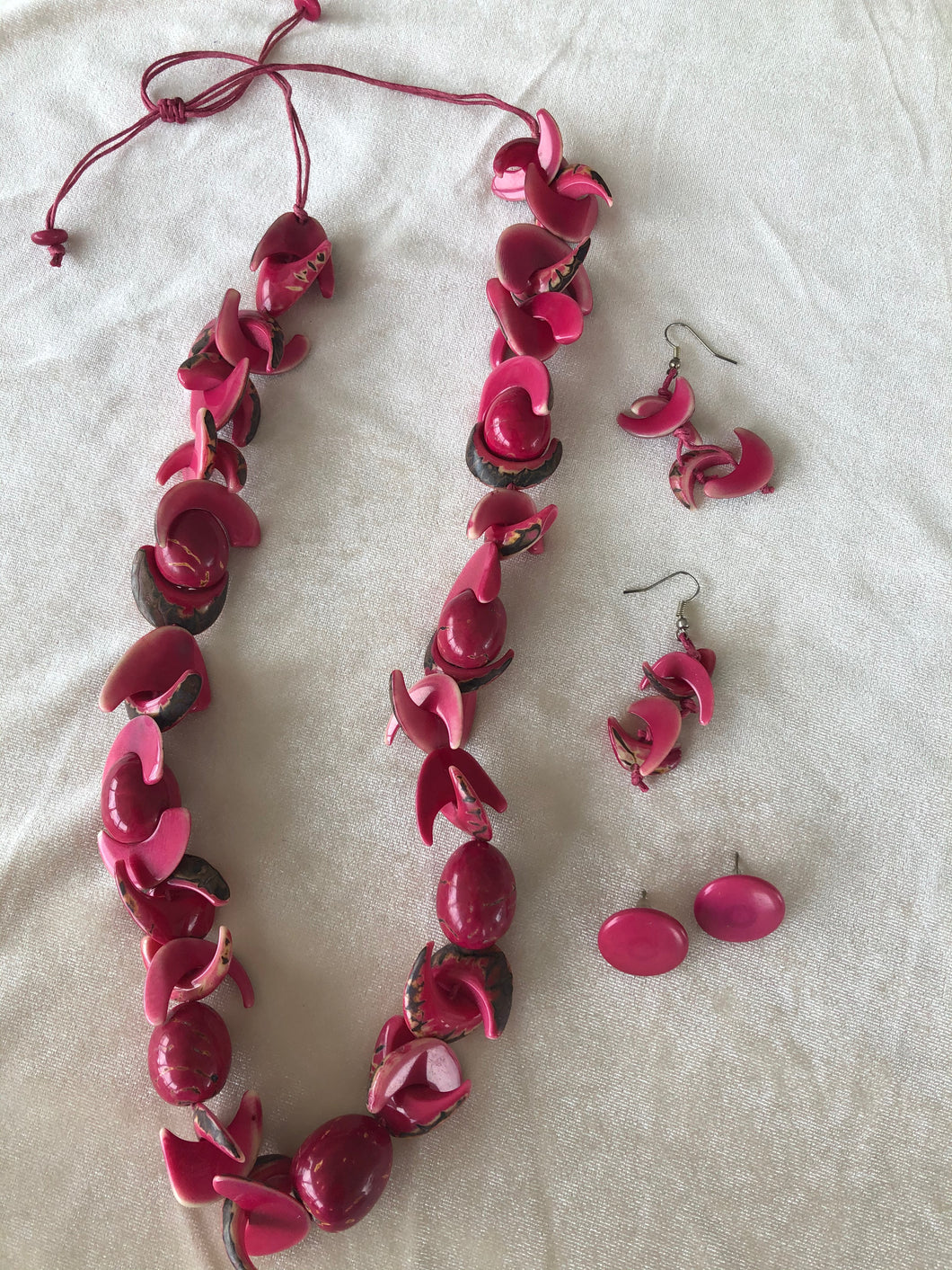 Samantha fuchsia tagua necklace with drop dangle and post matching earrings.