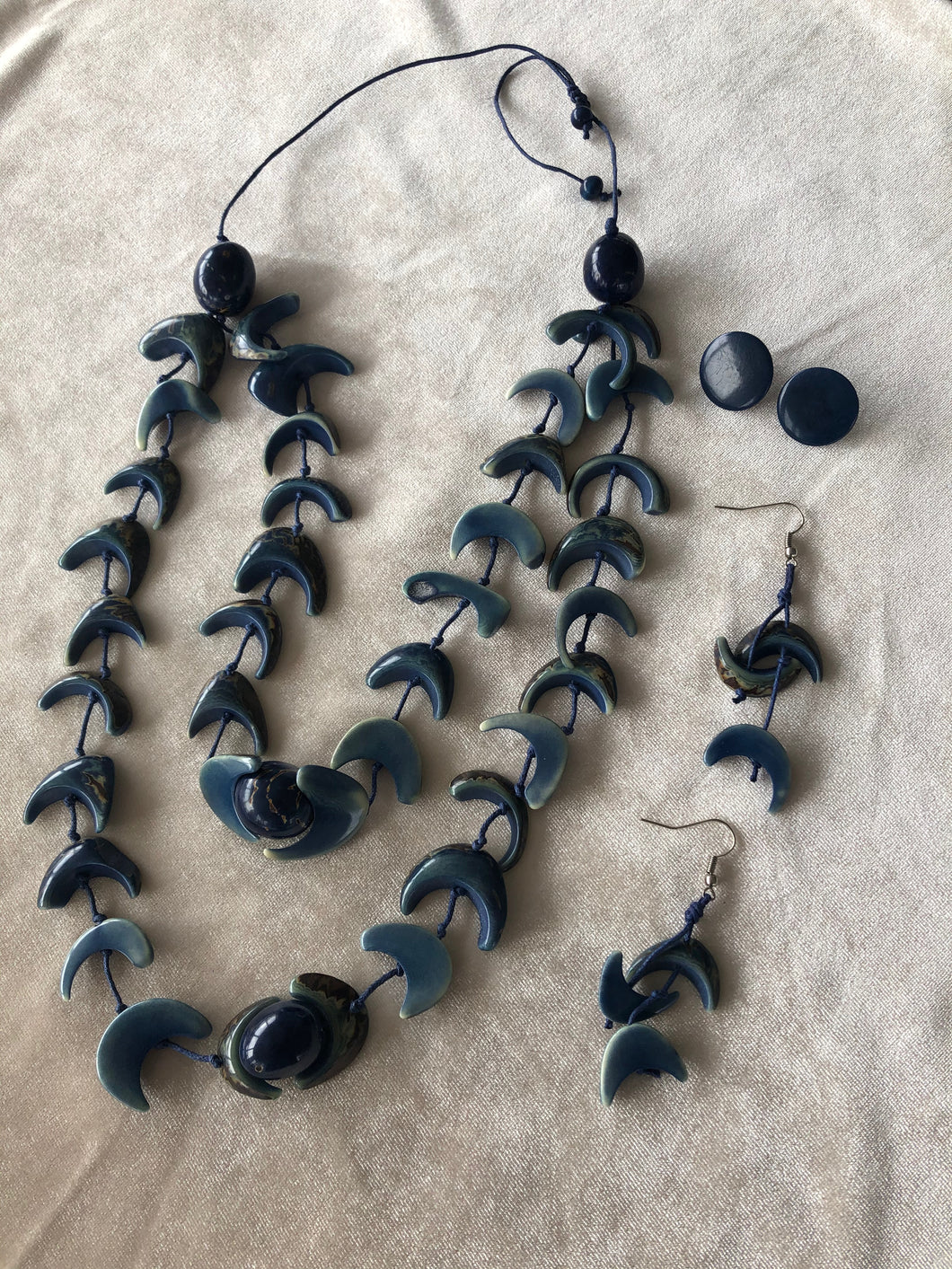 Isabel blue tagua necklace with drop dangle and post matching earrings.