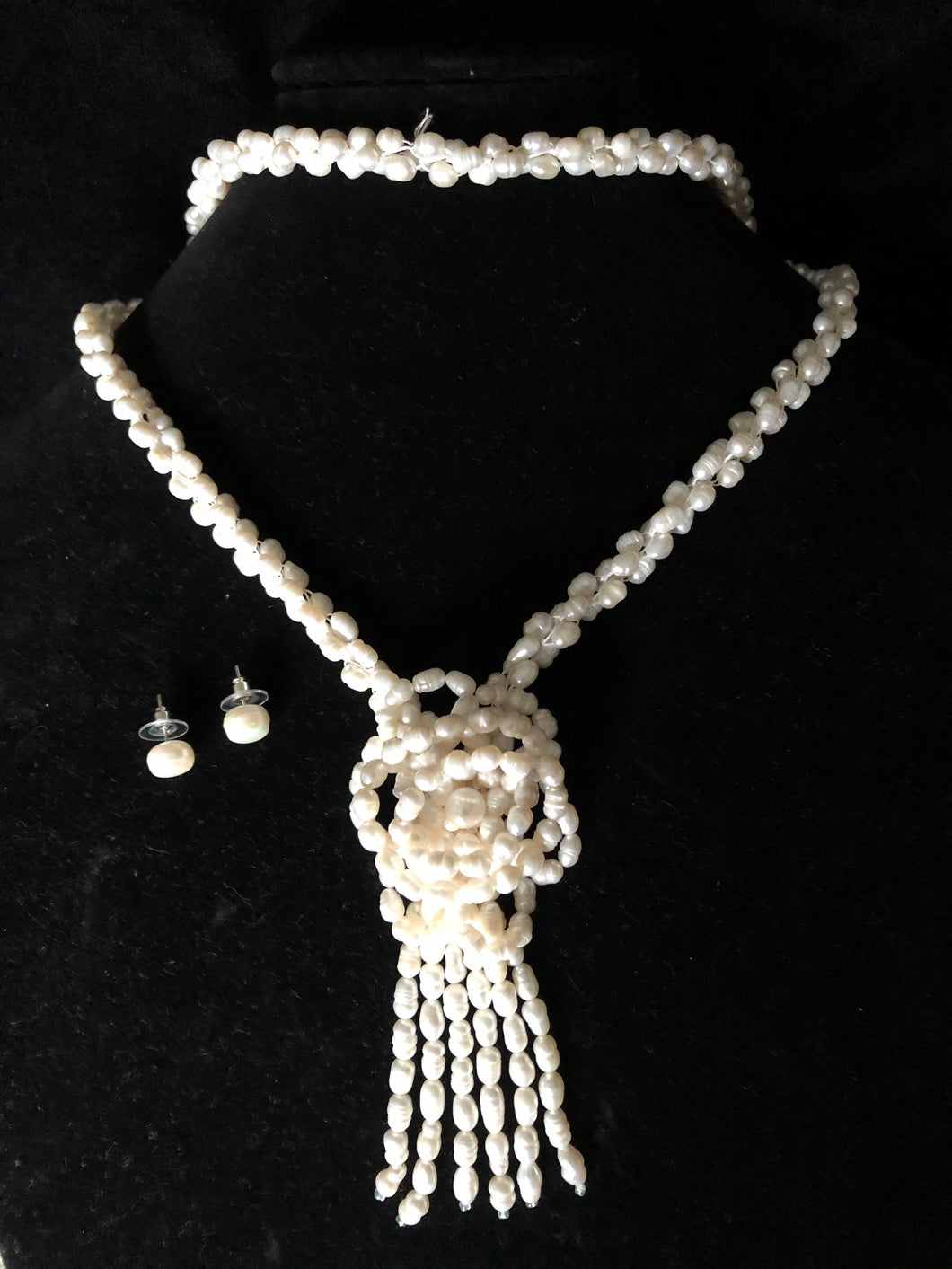 Rose white rice pearls necklace and earrings.