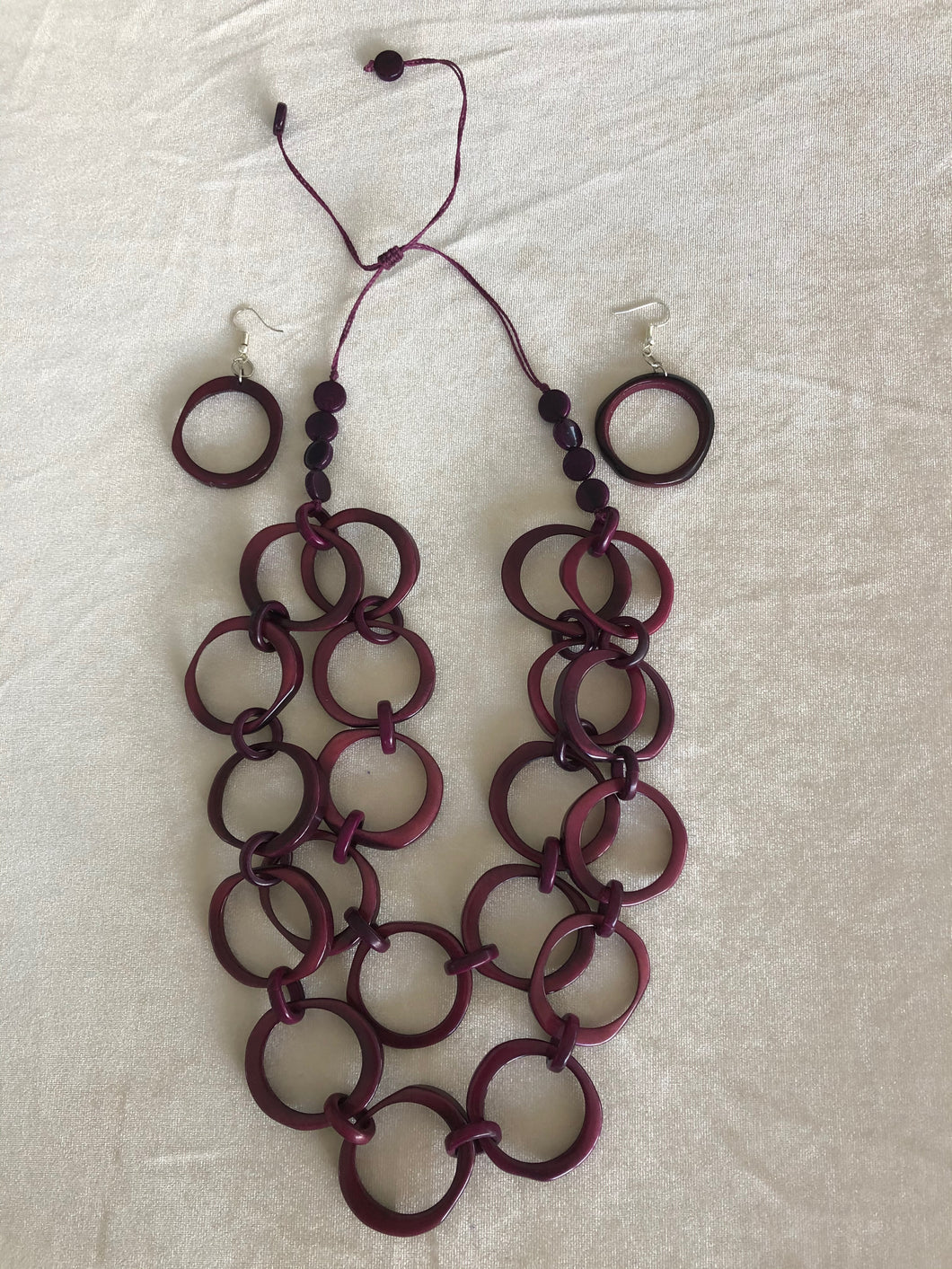 Cloe violet tagua necklace and drop dangle matching earrings.